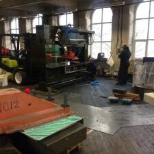 cutting systems UK ATOM CNC machine install through pederstrian doorway into Northern 2nd floor mill4